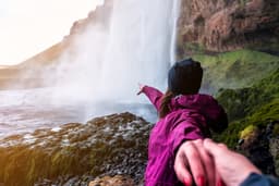 follow me with girl in violet jacket on Iceland waterfall follow me with girl on Iceland waterfall