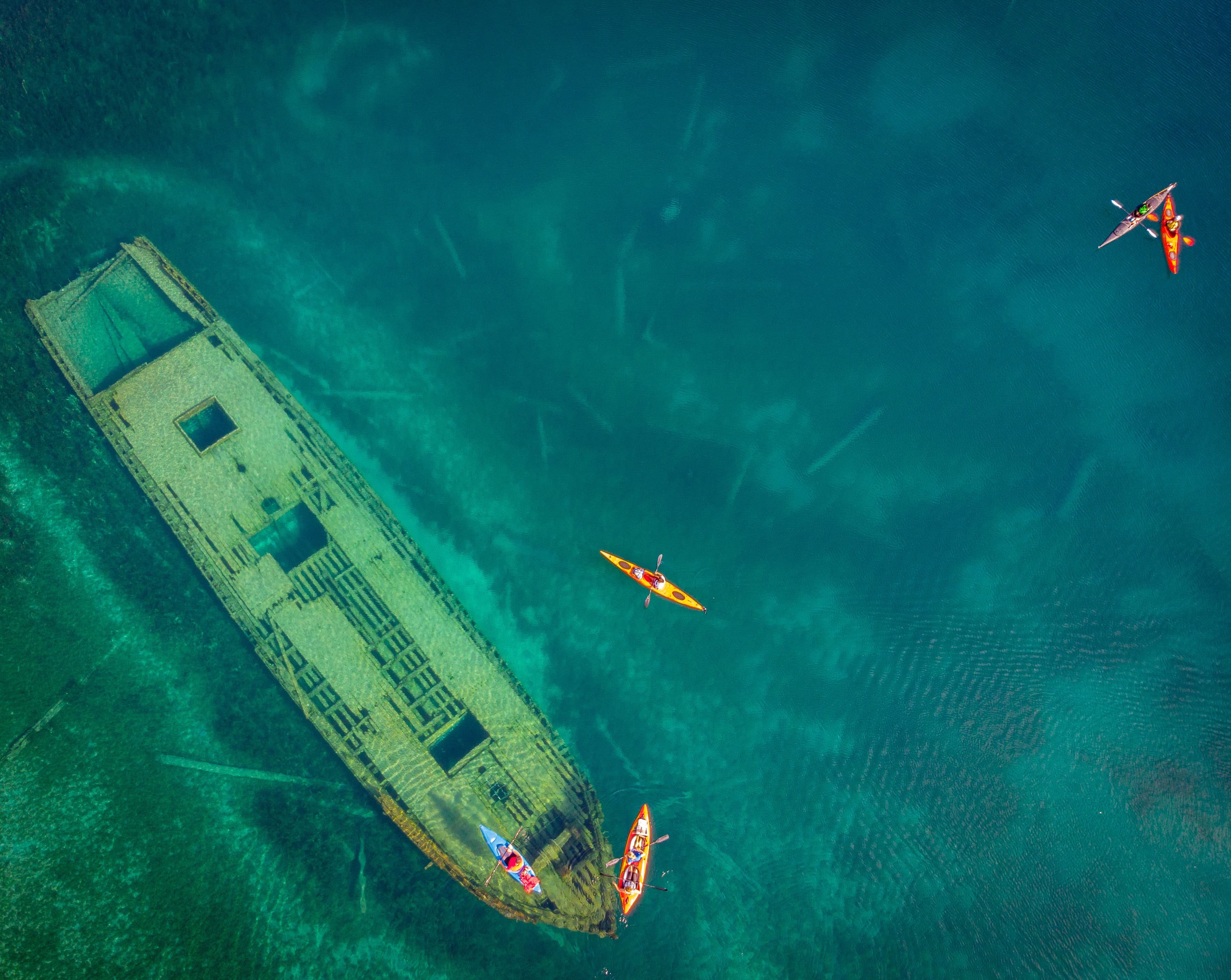 Shipwreck at Tobermory with kayakers, aerial view, Ontario, Canada Shipwreck at Tobermory with kayakers, aerial view, Ontario, Canada