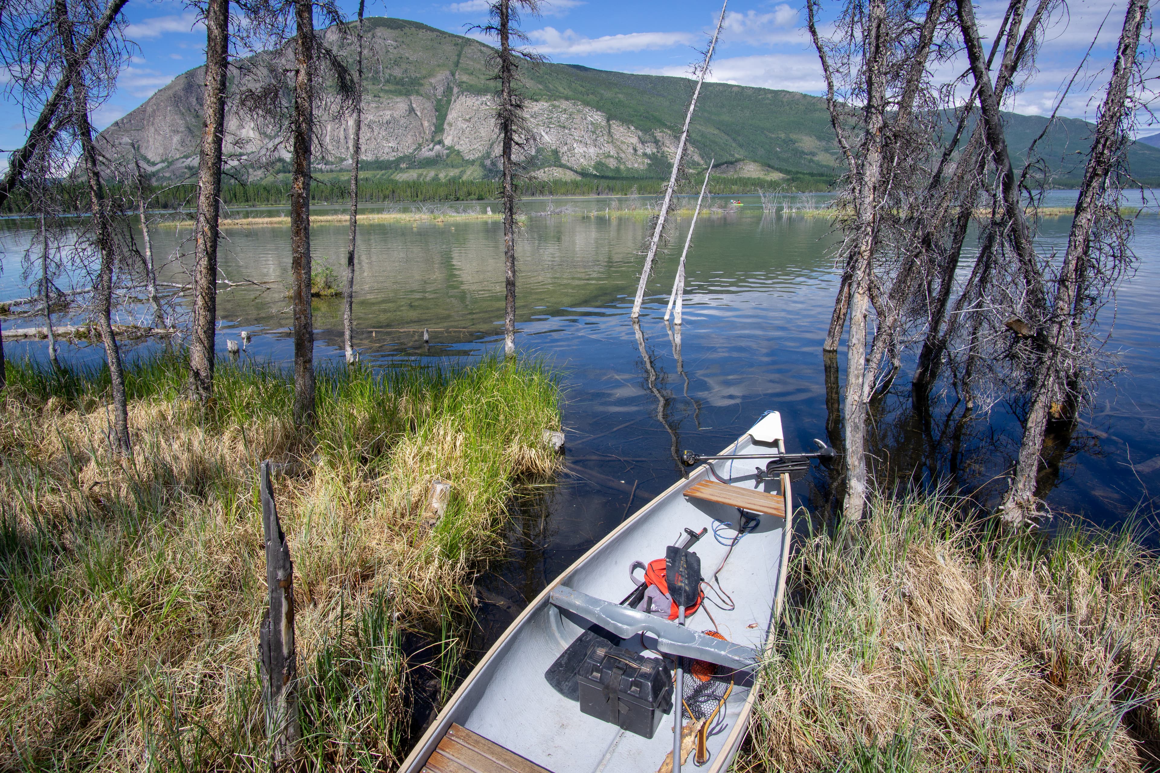 Boat by the lake in Whitehorse Canada