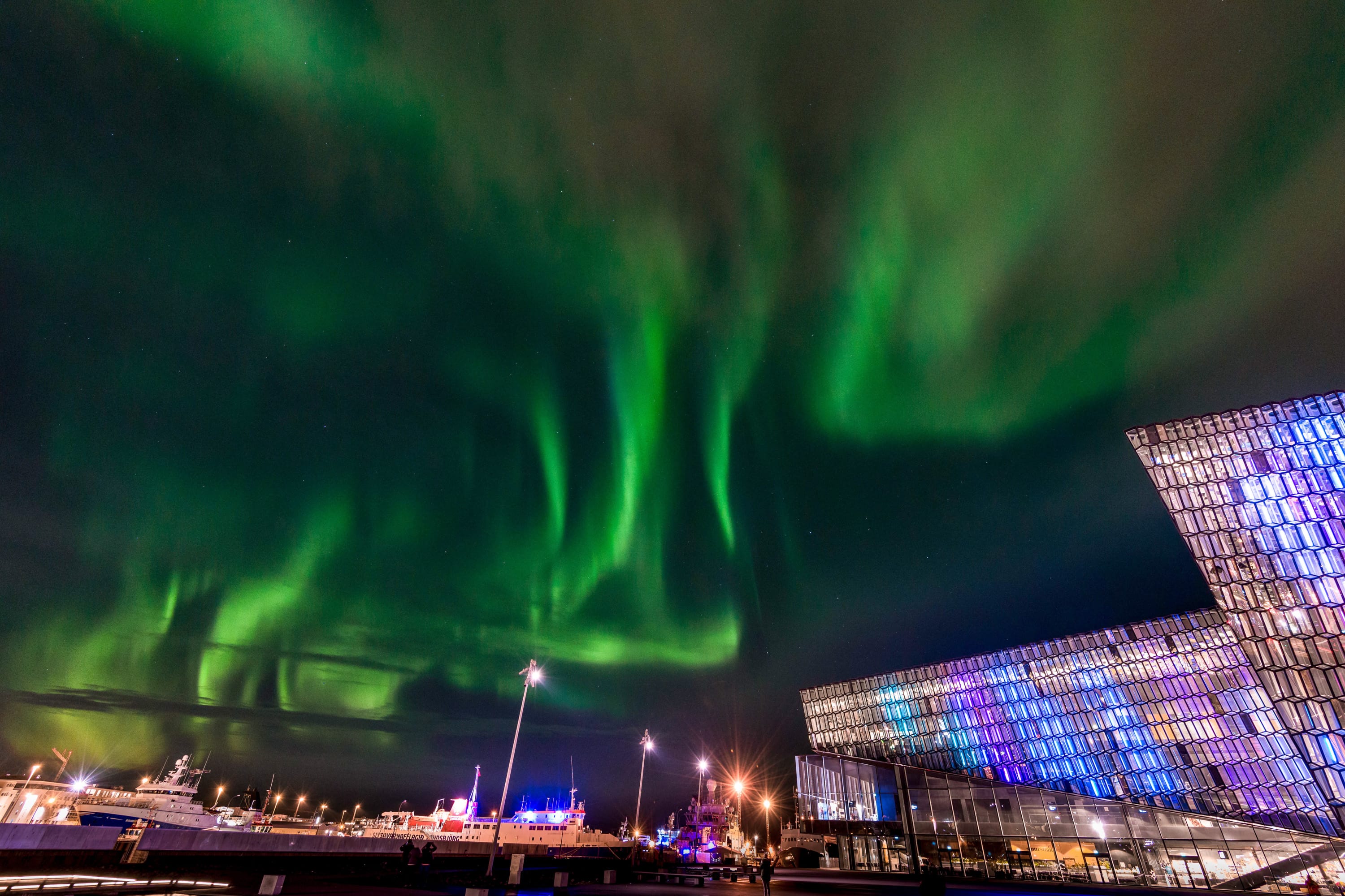 Northern Lights at Harpa Concert Hall in Reykjavik, Iceland