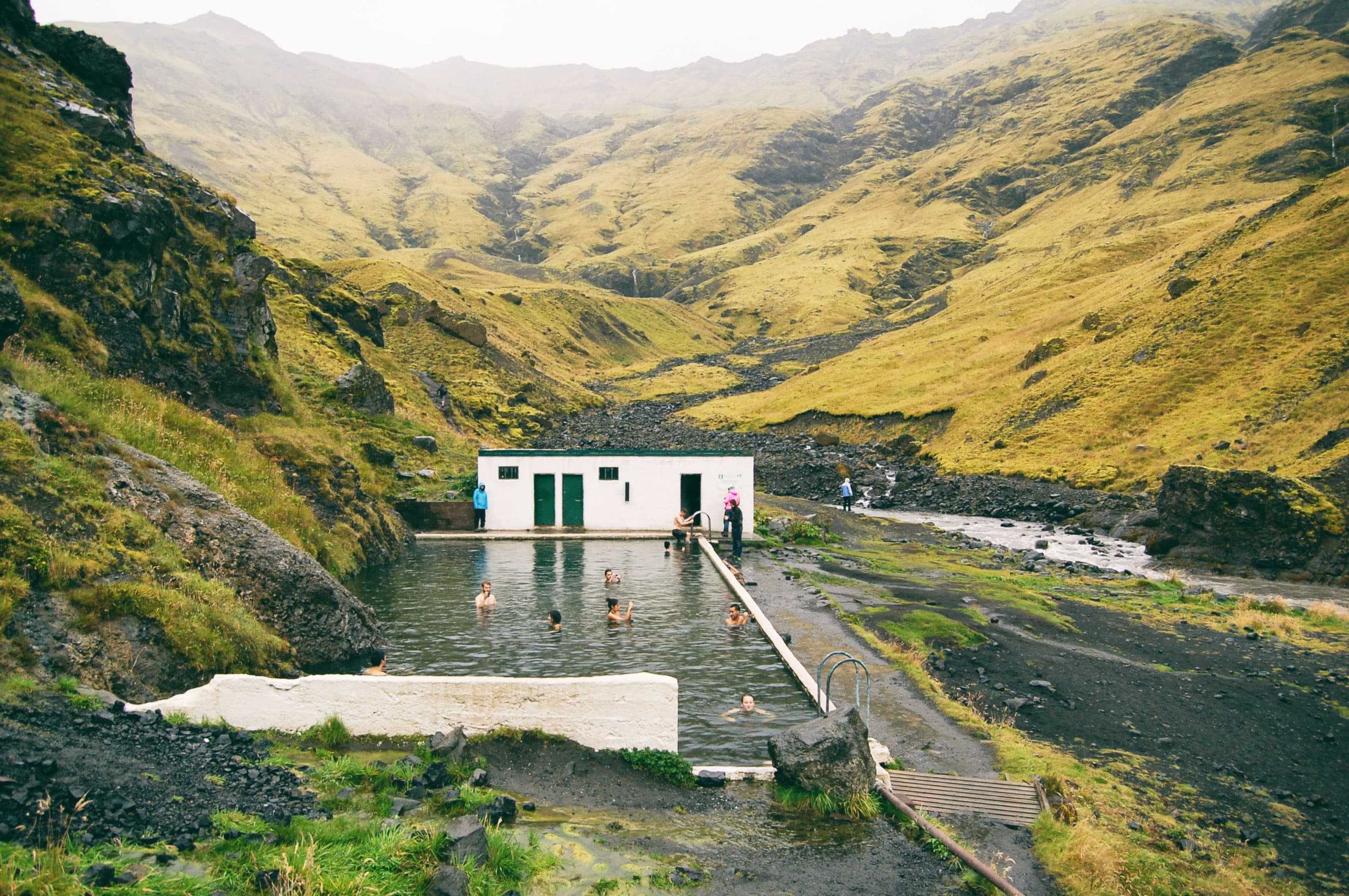 Secret swimming pool in the valley, Iceland Secret swimming pool in the valley, Iceland