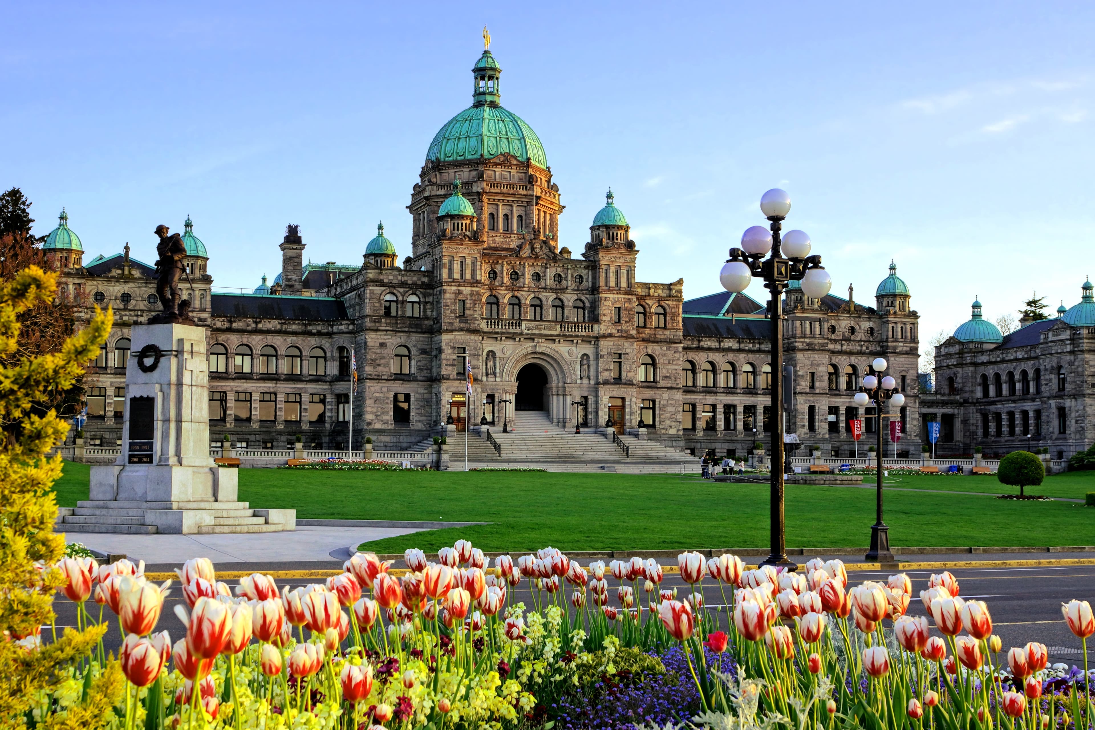 Historic British Columbia provincial parliament building with spring tulips, Victoria, BC, Canada British Columbia Region 14