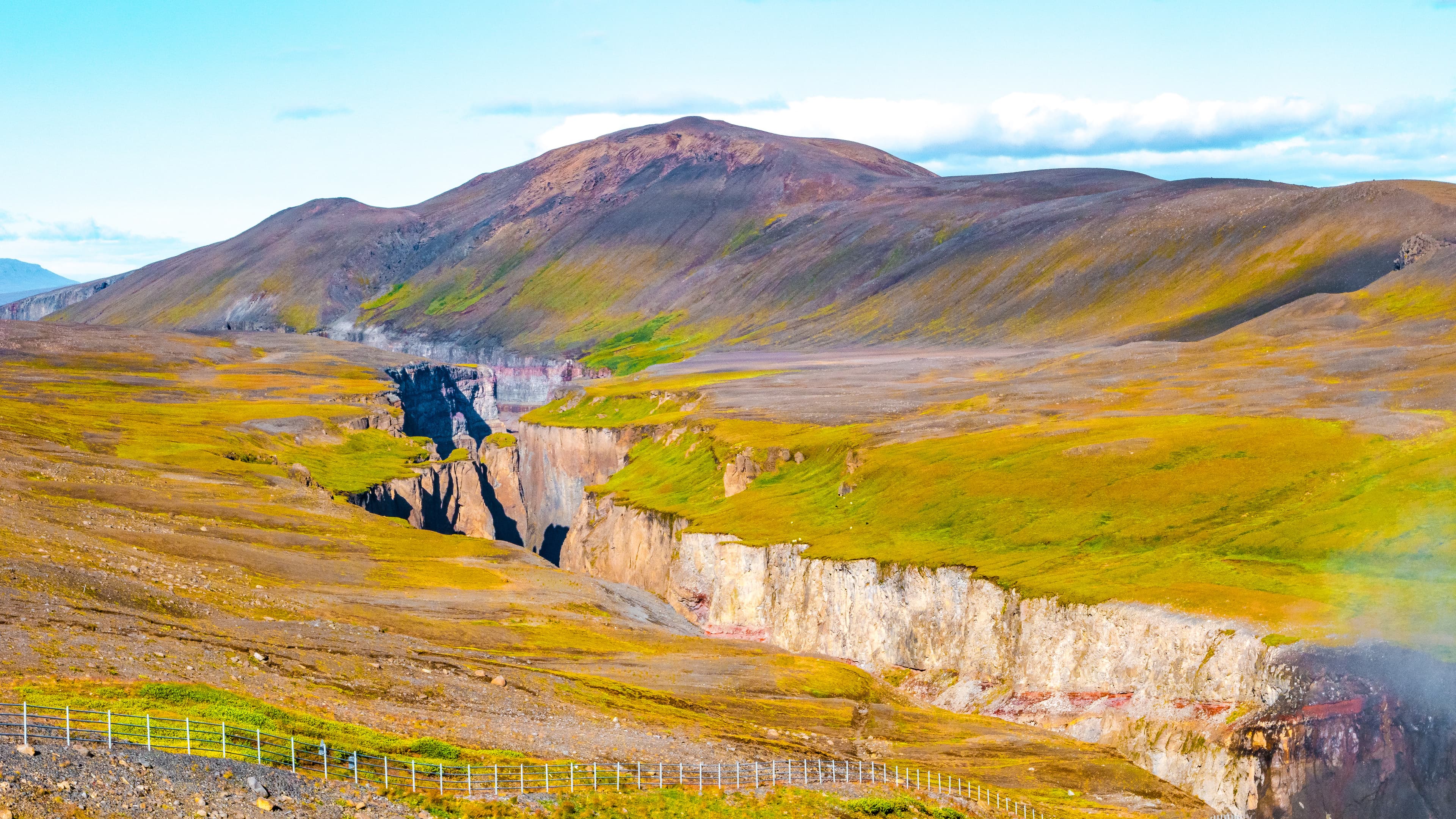 Hafrahvammagljufur canyon, Iceland. Panoramic over one of the biggest canyons in Iceland. Beautiful Icelandic landscape, huge cliff, sunset colors Hafrahvammagljufur canyon, Iceland. Panoramic over one of the biggest canyons in Iceland. Beautiful Icelandic landscape, huge cliff, sunset colors