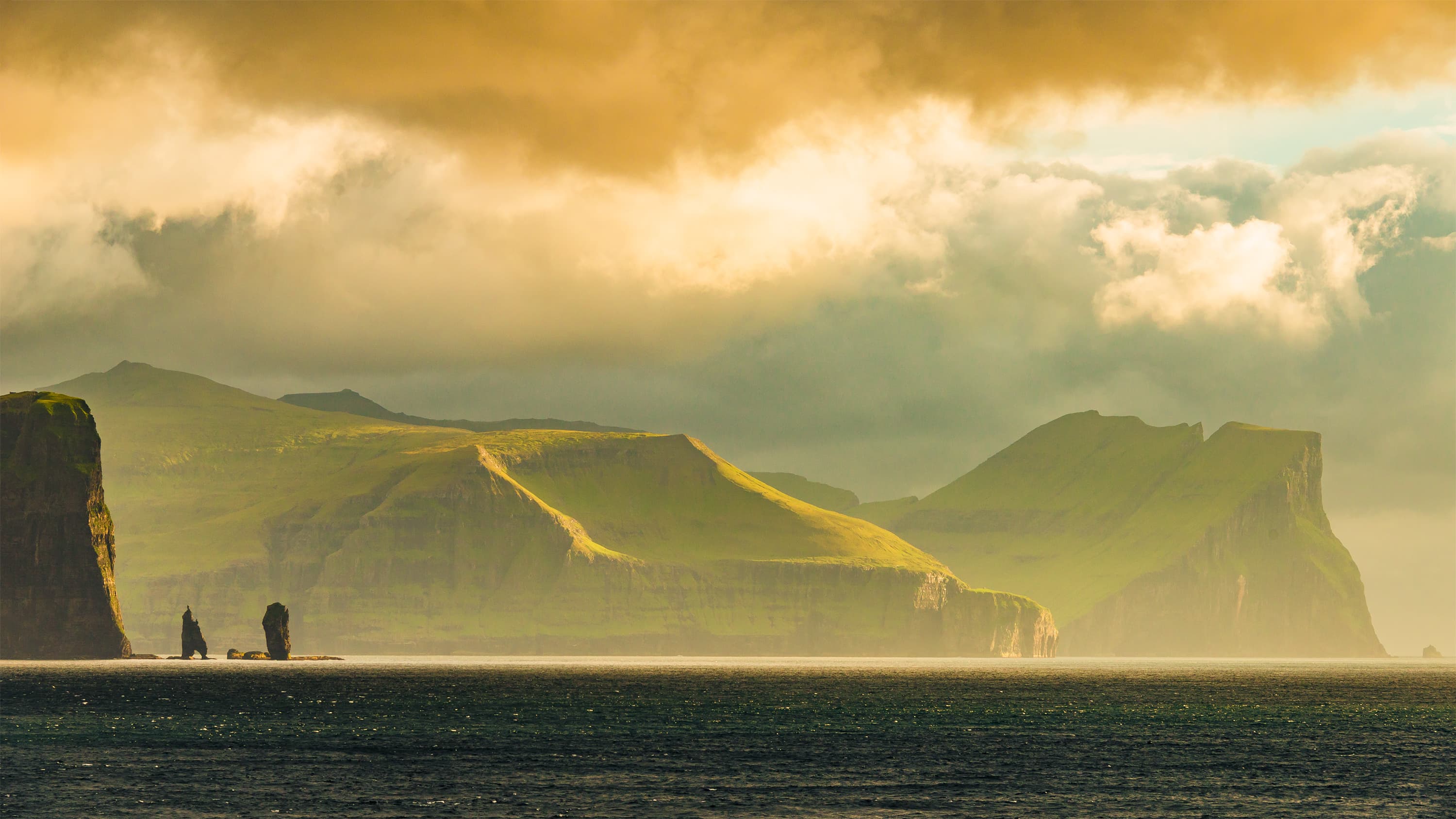 Panoramic view of Faroe islands seashore, summer time Panoramic view of Faroe islands seashore