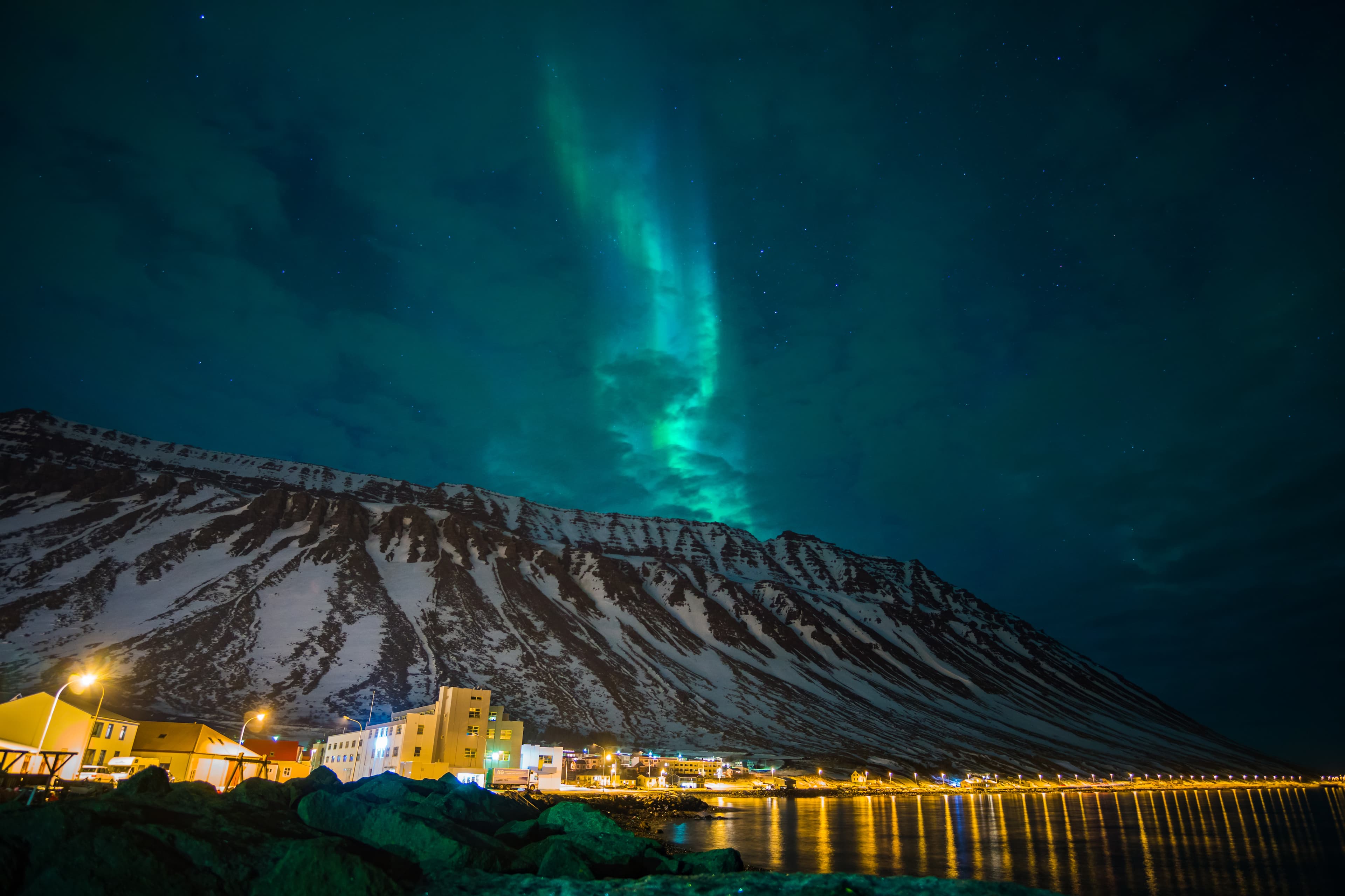northern lights over the mountains and a cloudy sky northern lights over the mountains and a cloudy sky