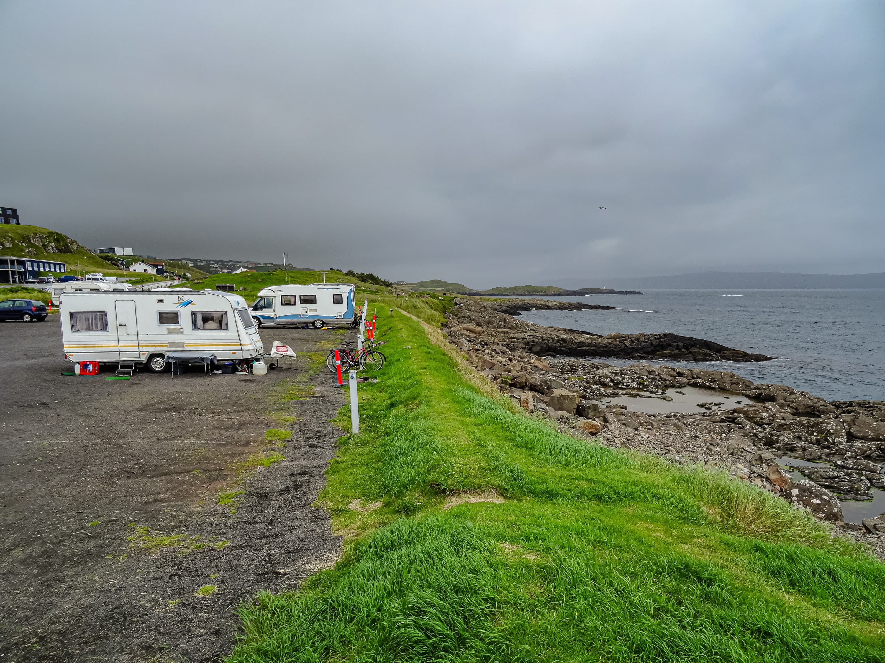 Modern camping site at the seashore of Torshavn in Faroe islands, Atlantic ocean Modern camping site at the seashore of Torshavn in Faroe islands, summer time, Atlantic ocean
