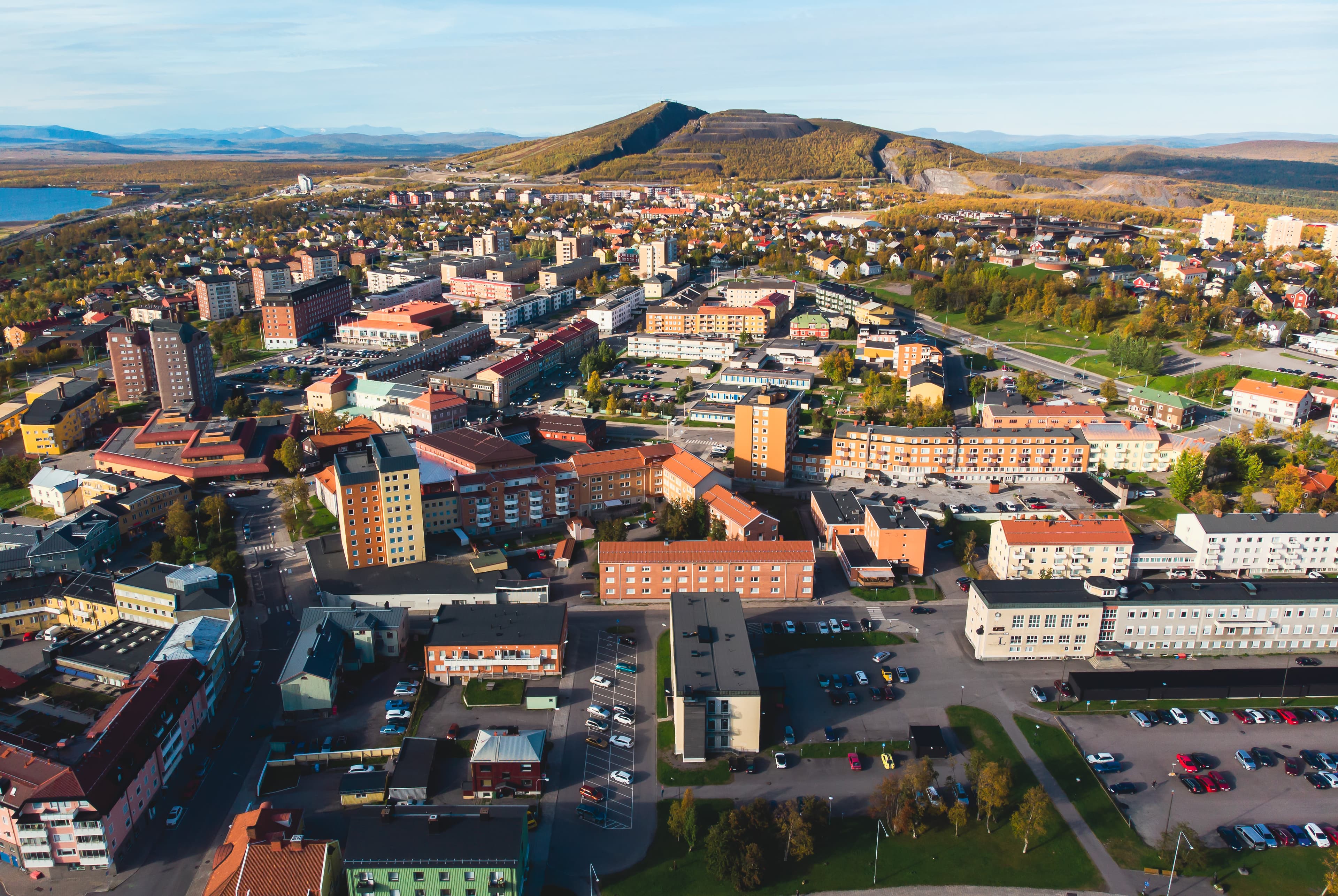 Aerial summer sunny view of Kiruna, the northernmost town in Sweden, province of Lapland, Norrbotten County, picture shot from drone
 Aerial summer sunny view of Kiruna, the northernmost town in Sweden, province of Lapland, Norrbotten County, picture shot from drone