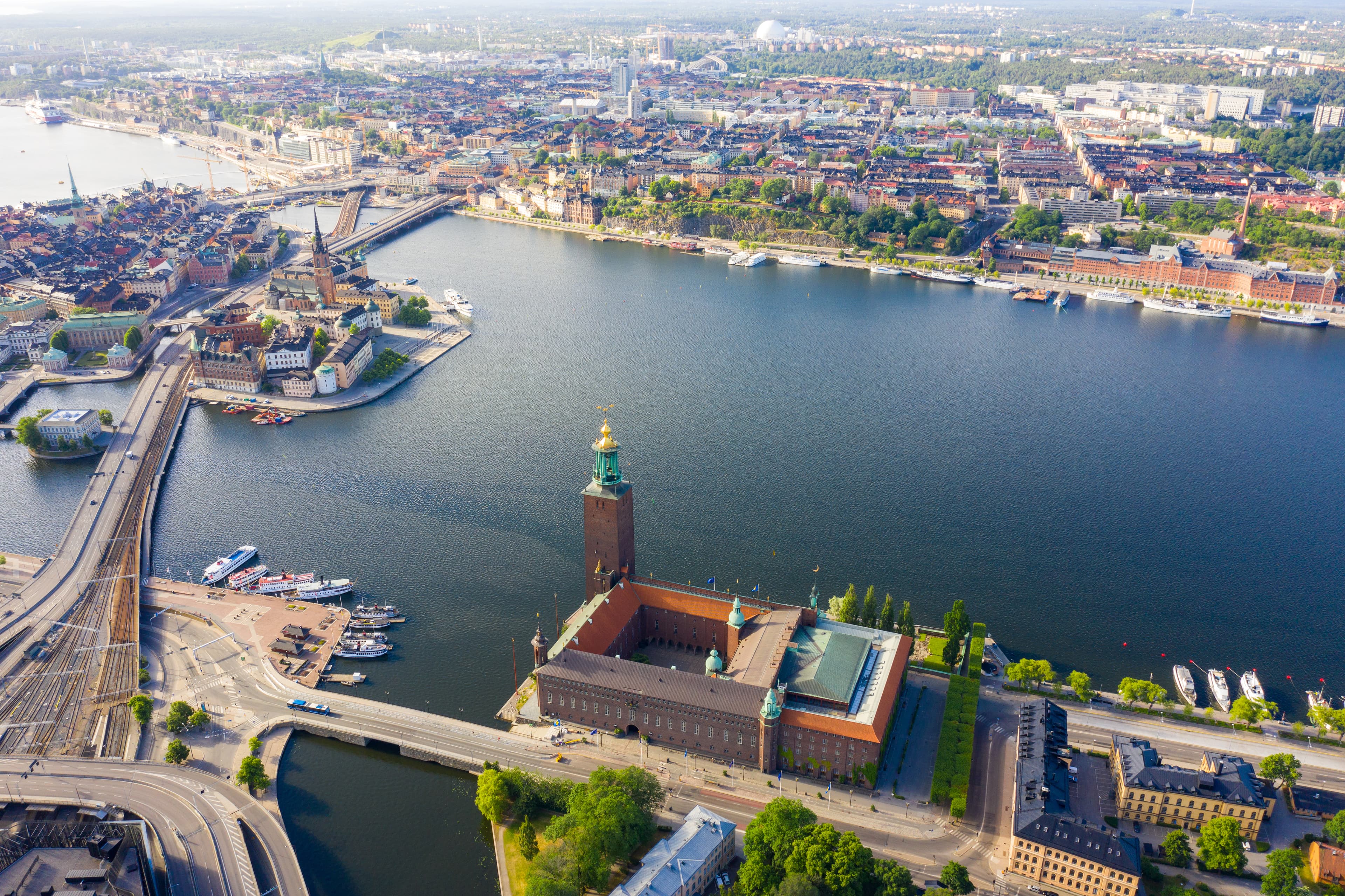 Stockholm, Sweden. Panorama of the city. Stockholm City Hall. Built in 1923, red brick town hall. Aerial photography Stockholm, Sweden. Panorama of the city. Stockholm City Hall. Built in 1923, red brick town hall. Aerial photography