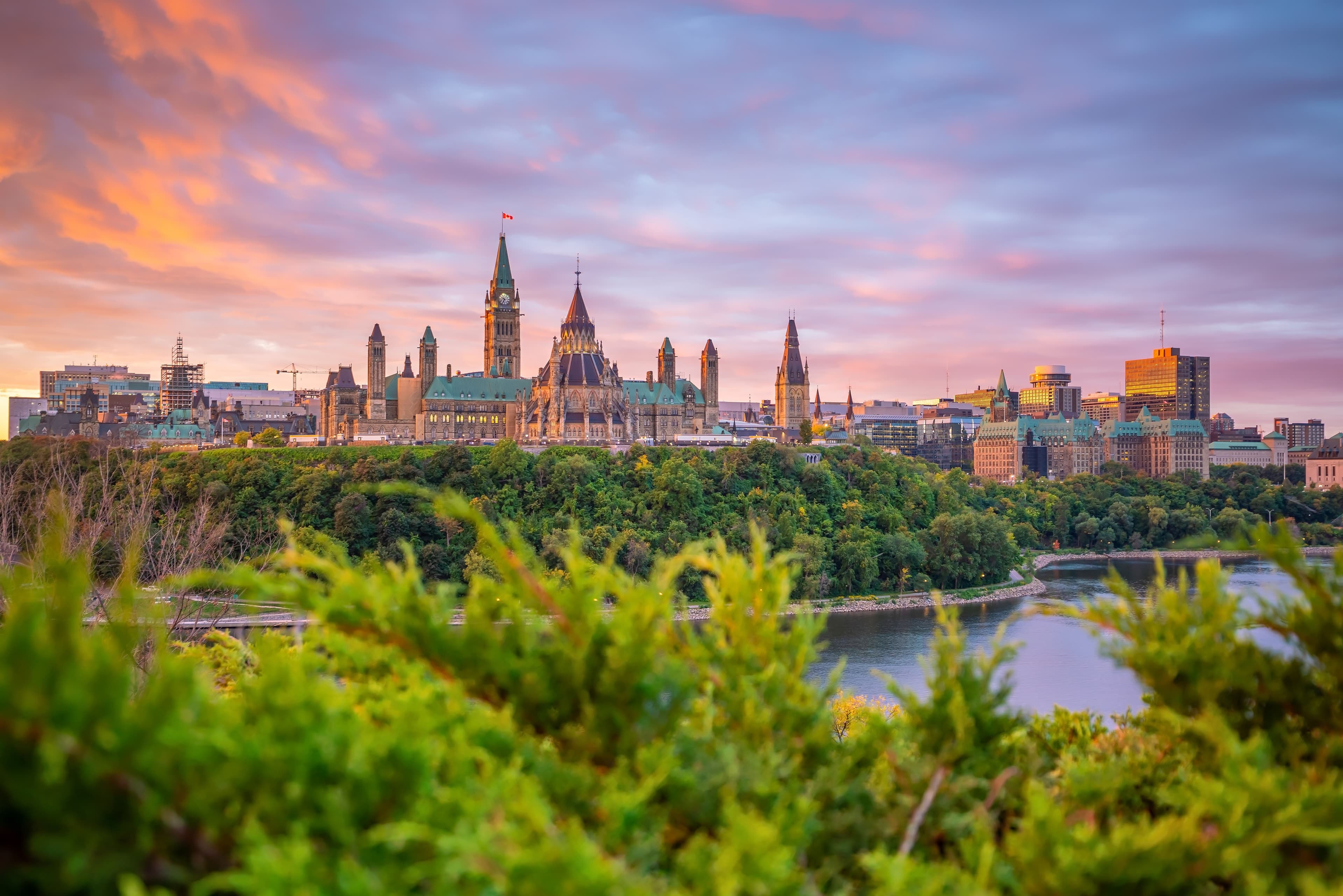 Parliament Hill in Ottawa, Ontario, Canada at Sunset  Parliament Hill in Ottawa, Ontario, Canada