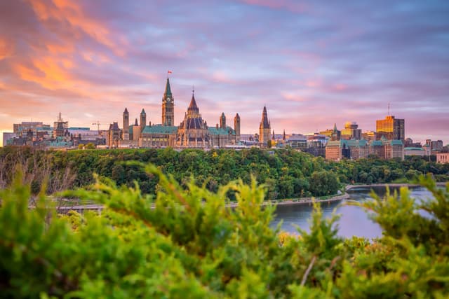 Parliament Hill in Ottawa, Ontario, Canada at Sunset  Parliament Hill in Ottawa, Ontario, Canada