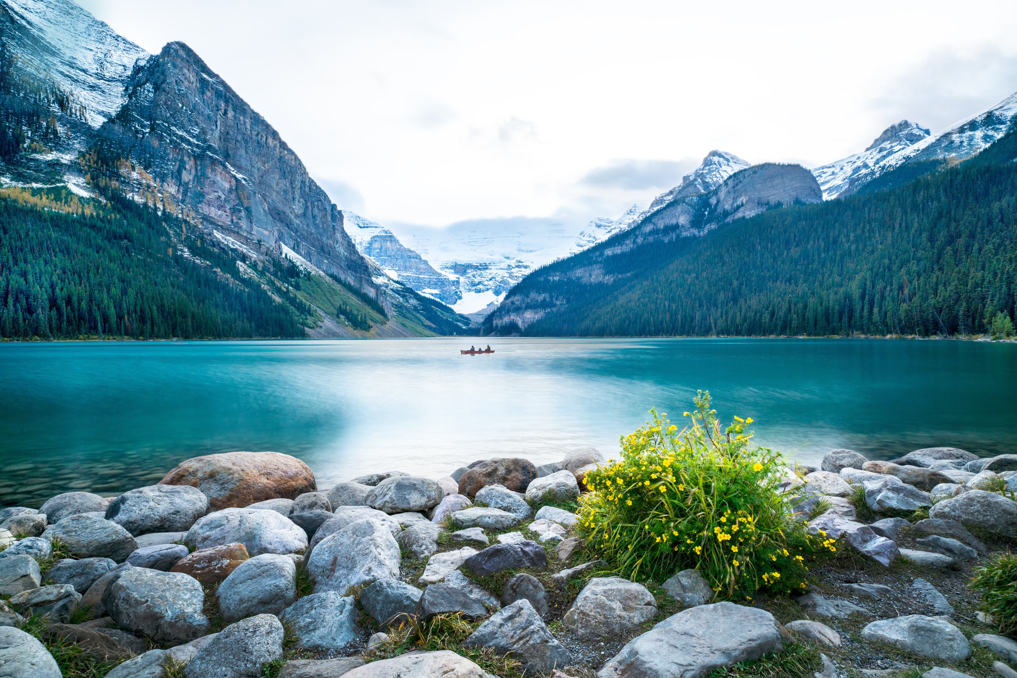 Long exposure photography of A canoe in Lake Louise, Banff National park, ALberta, Canada A canoe in Lake Louise, Banff National park, ALberta, Canada