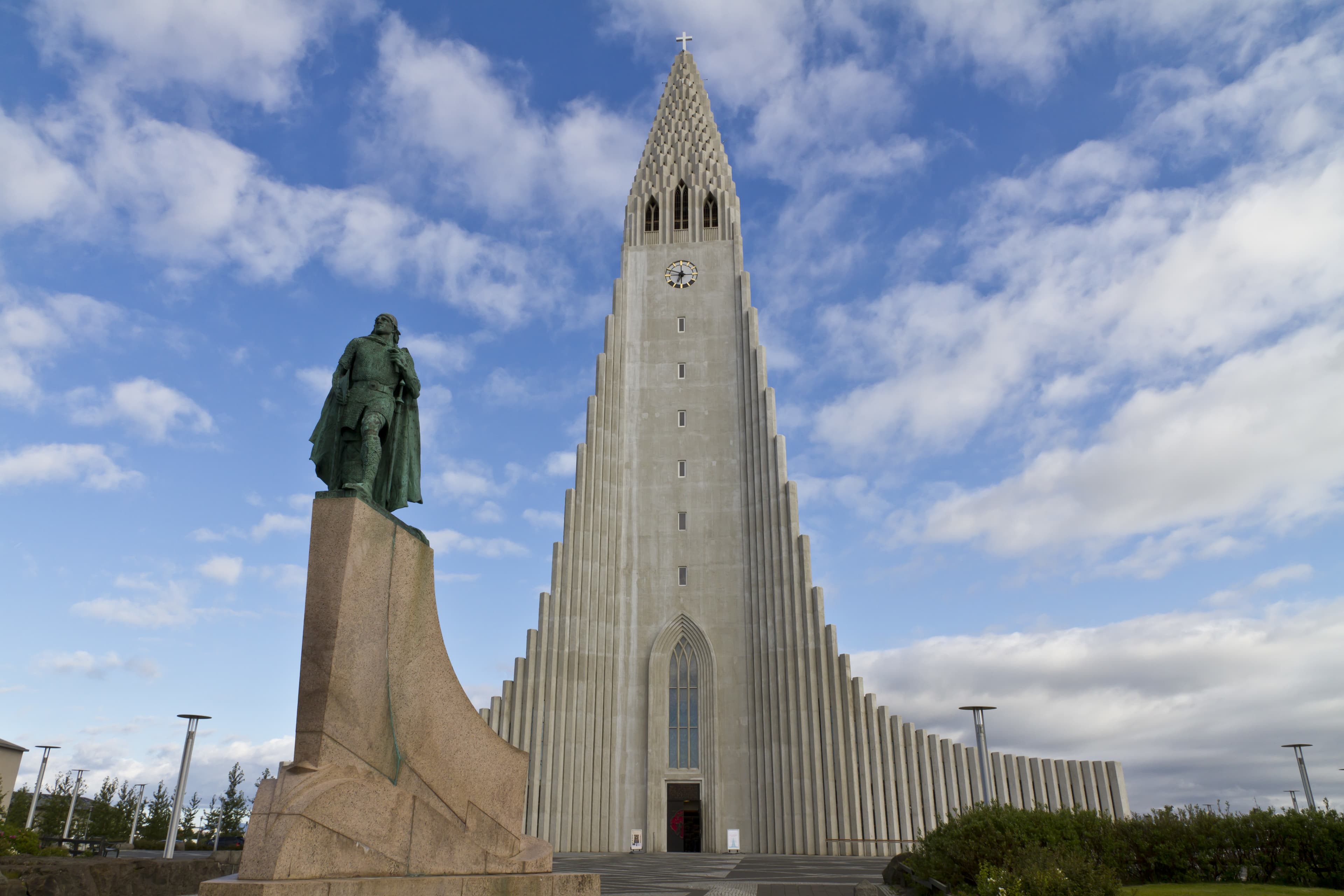 Hallgrimskirkja Church, Reykjavik,Iceland, with statue of Lief Erikson,one of the discoverers of North America. The church architecture echoes the collumnar basalt formations common in Icelandic geology Hallgrimskirkja Church, Reykjavik,Iceland, with statue of Lief Erikson