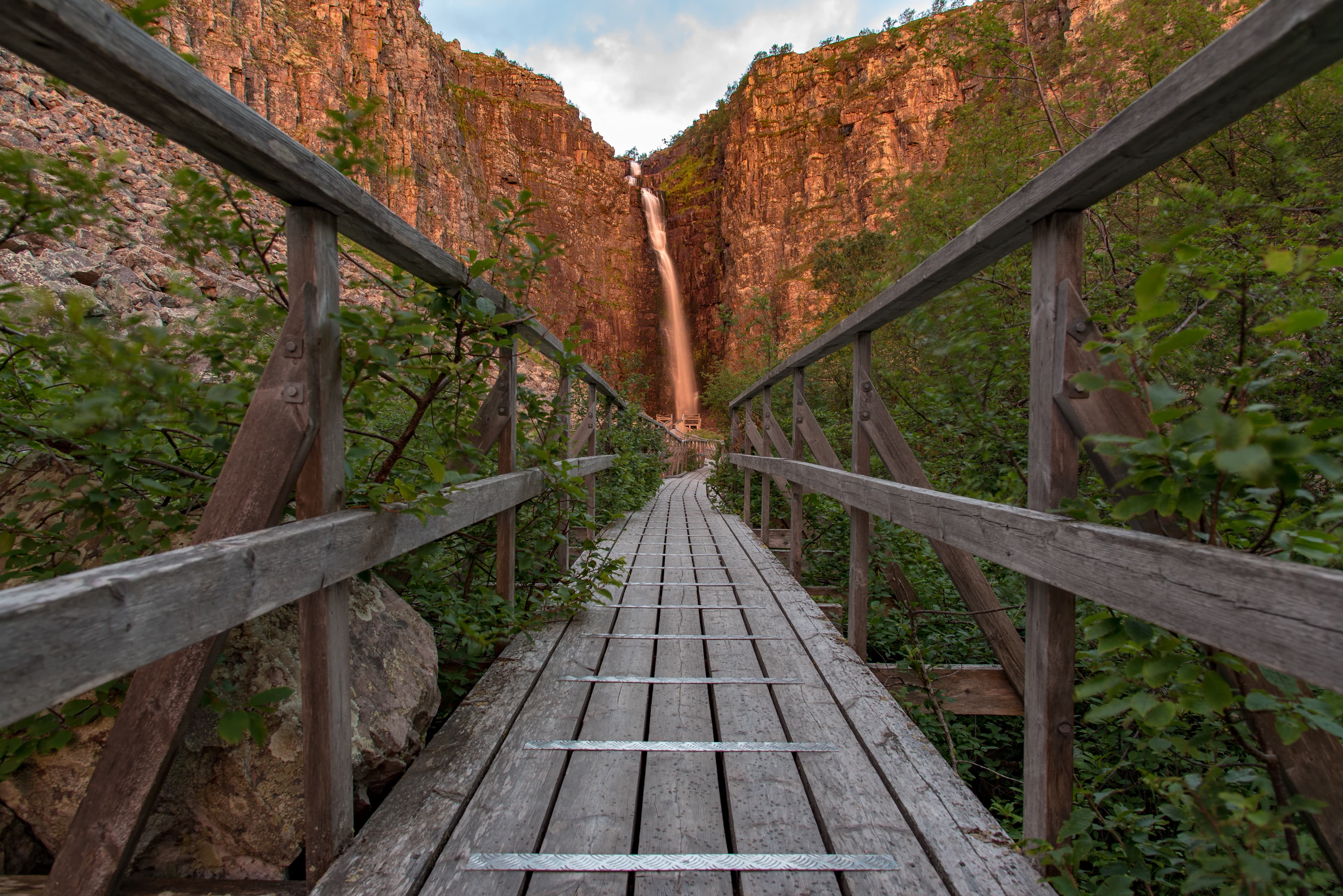 sunrise over a footbridge in fulufjallet national park dalarna Sweden sunrise over a footbridge in fulufjallet national park Sweden
