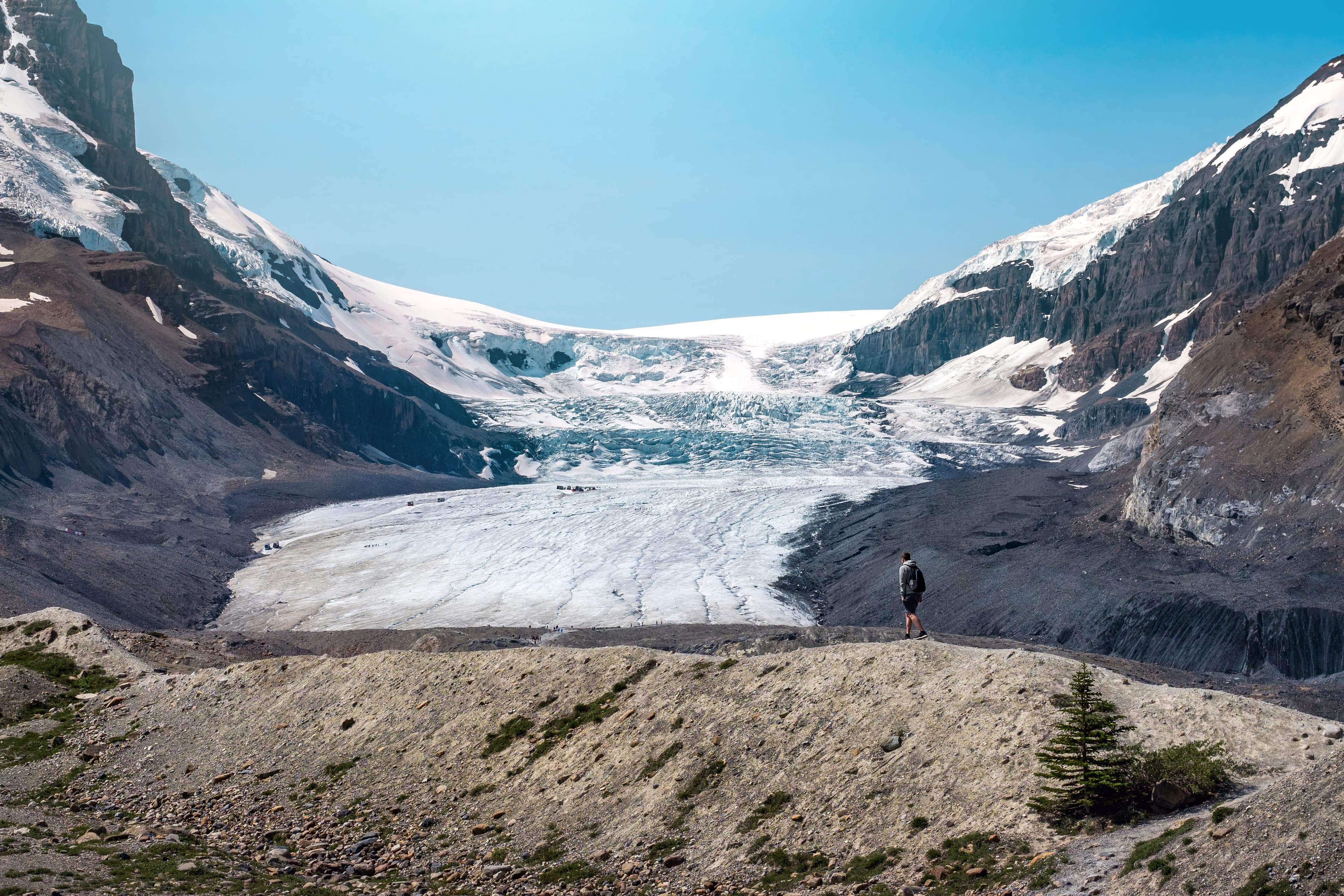 Athabasca Glacier during summer in Jasper National Park, Canadian Rockies, Alberta, Canada.  Panoramic view of Columbia Icefields Parkway