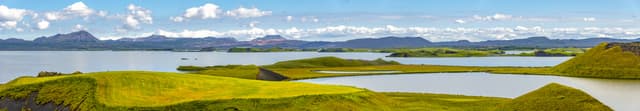 Panoramic view of lake Myvatn and pseudo craters aka volcanic near Skutustadir on Iceland Panoramic view of lake Myvatn and pseudo craters aka volcanic near Skutustadir on Iceland, summer time