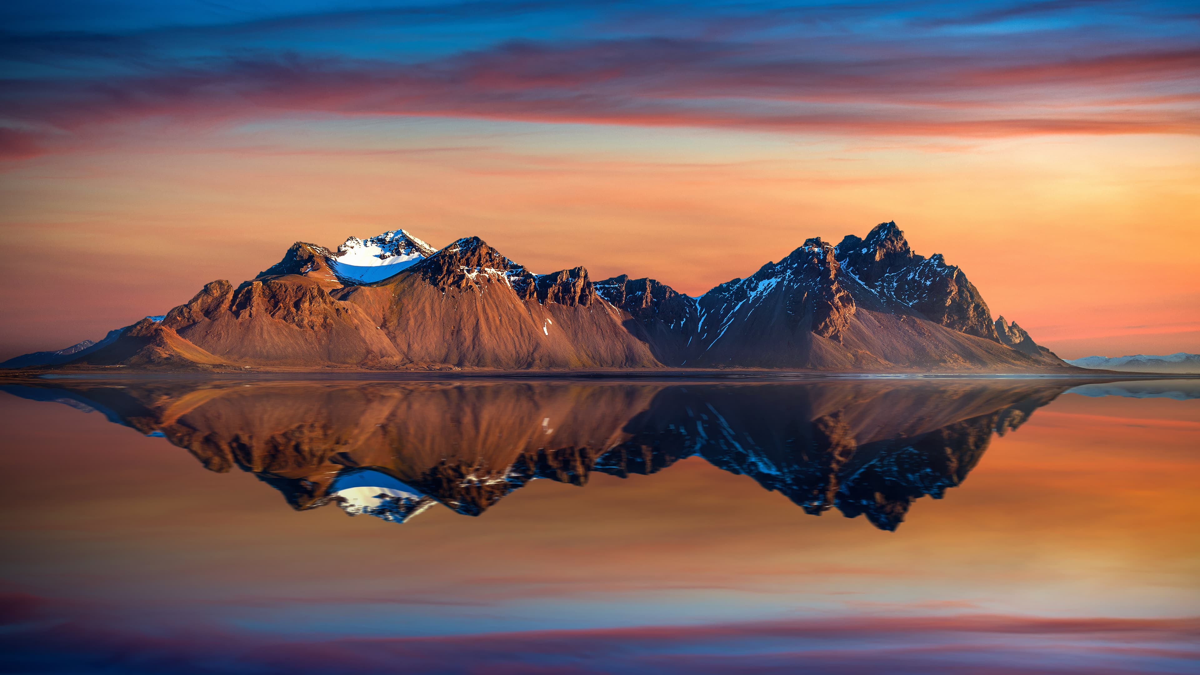 Vestrahorn mountains at sunset in Stokksnes, Iceland. Vestrahorn mountains at sunset in Stokksnes, Iceland.
