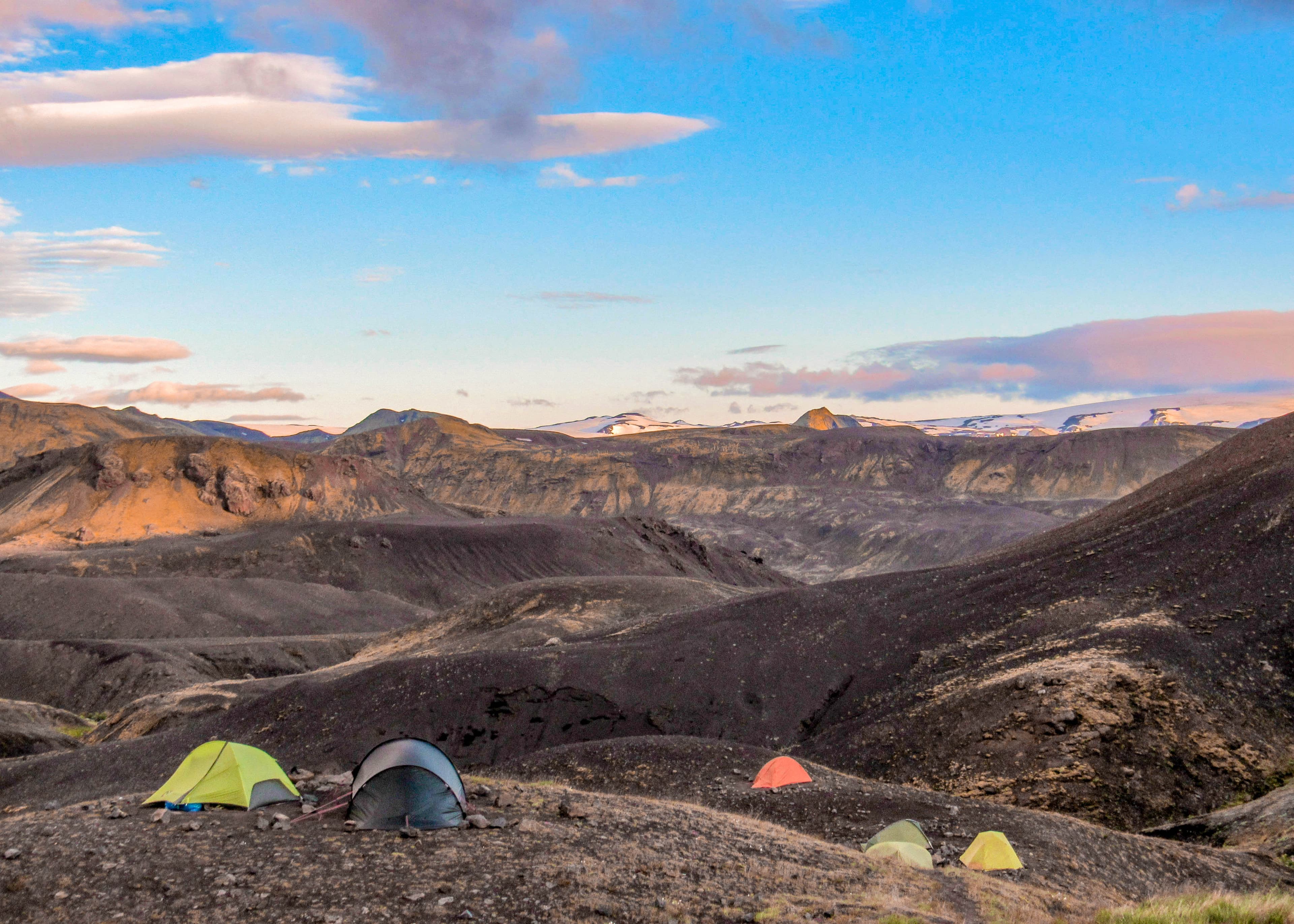 Botnar-Ermstur campsite and sunset above volcanic landscape, Laugavegur Trail from Thorsmork to Landmannalaugar, Higlands of Iceland, Europe Sunset landscape with campsite of Botnar-Ermstur, Laugavegur Trail from Thorsmork to Landmannalaugar, Iceland