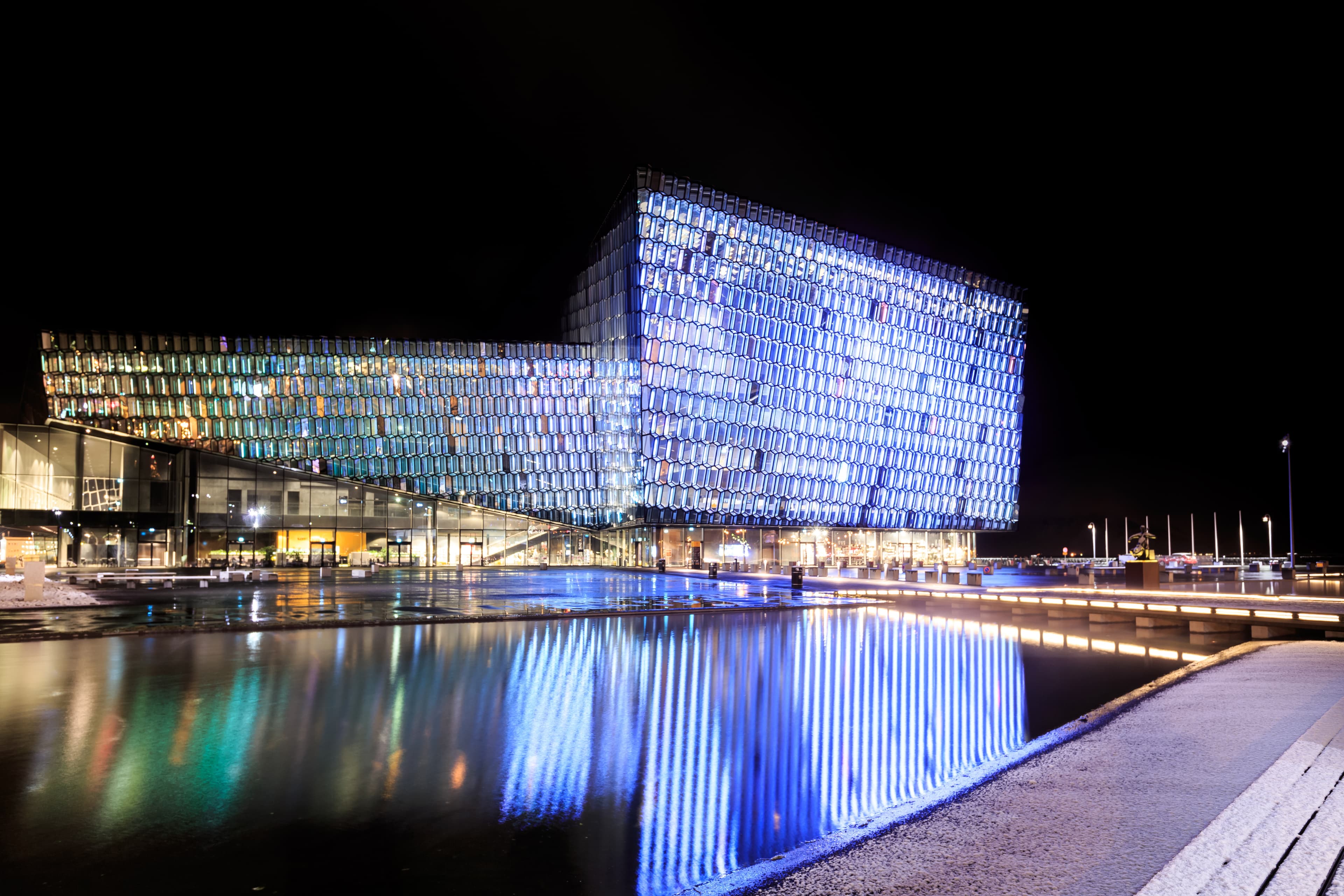 REYKJAVIK, ICELAND - MARCH 26, 2015: Night scene of Harpa Concert Hall in Reykjavik, Iceland. It was opened on May 4, 2013. Night scene of Harpa Concert Hall in Reykjavik