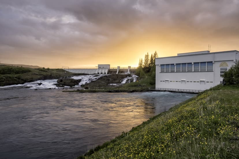 Sunset over Ljosafoss hydro powerplant in Iceland, very dramatic light with sunset in the background Sunset over Hydro electric powerplant