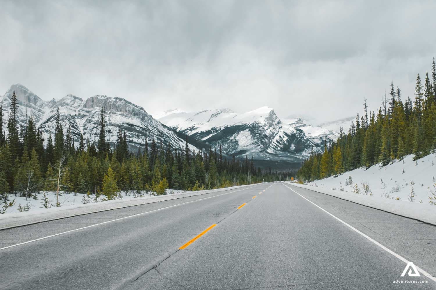 jasper-national-park-canada-landscape-winter-road-snow-mountain-peaks-1