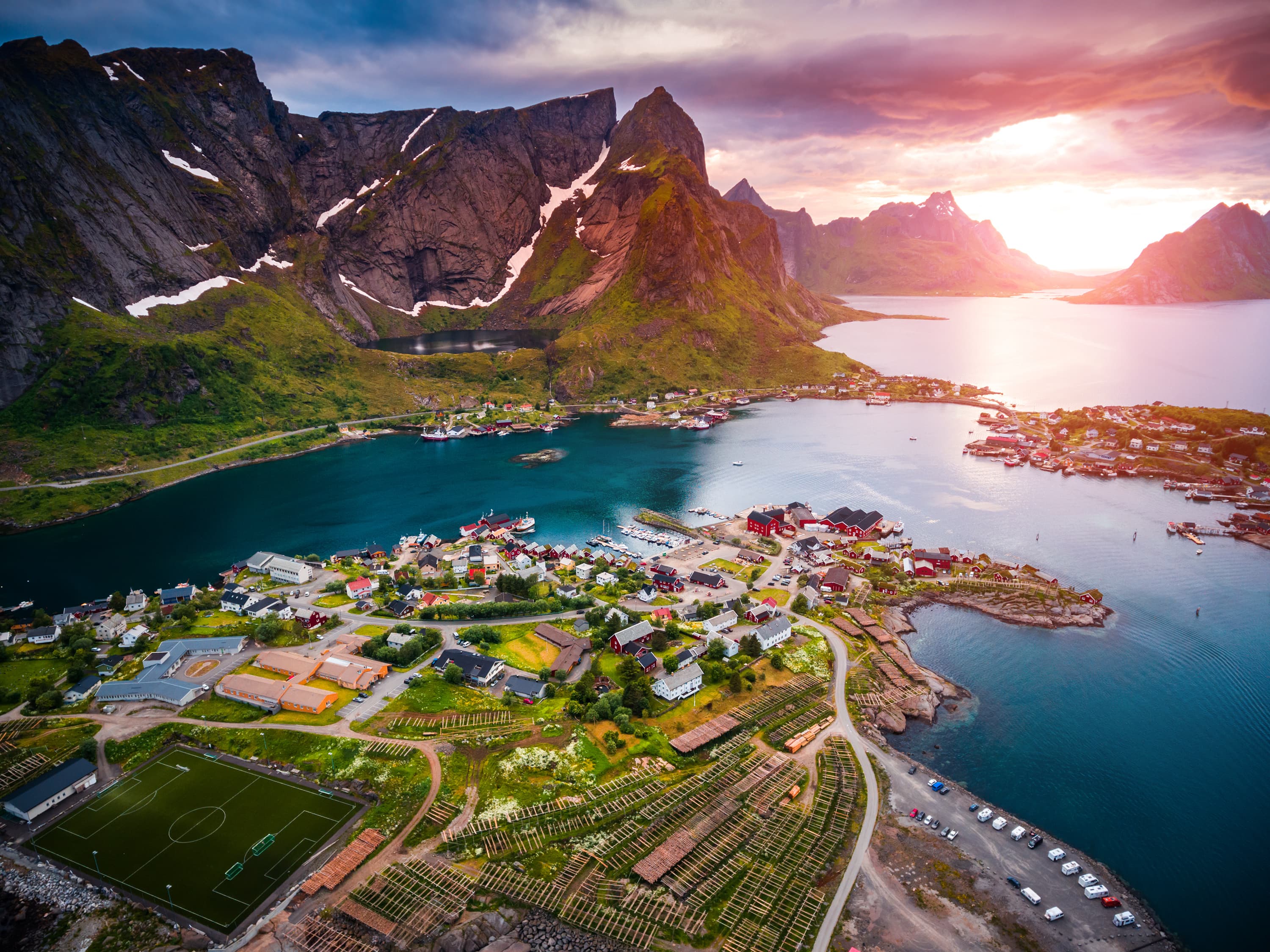 Lofoten islands is an archipelago aerial photography., Norway. Is known for a distinctive scenery with dramatic mountains and peaks, open sea and sheltered bays, beaches and untouched lands. Lofoten archipelago islands aerial photography.