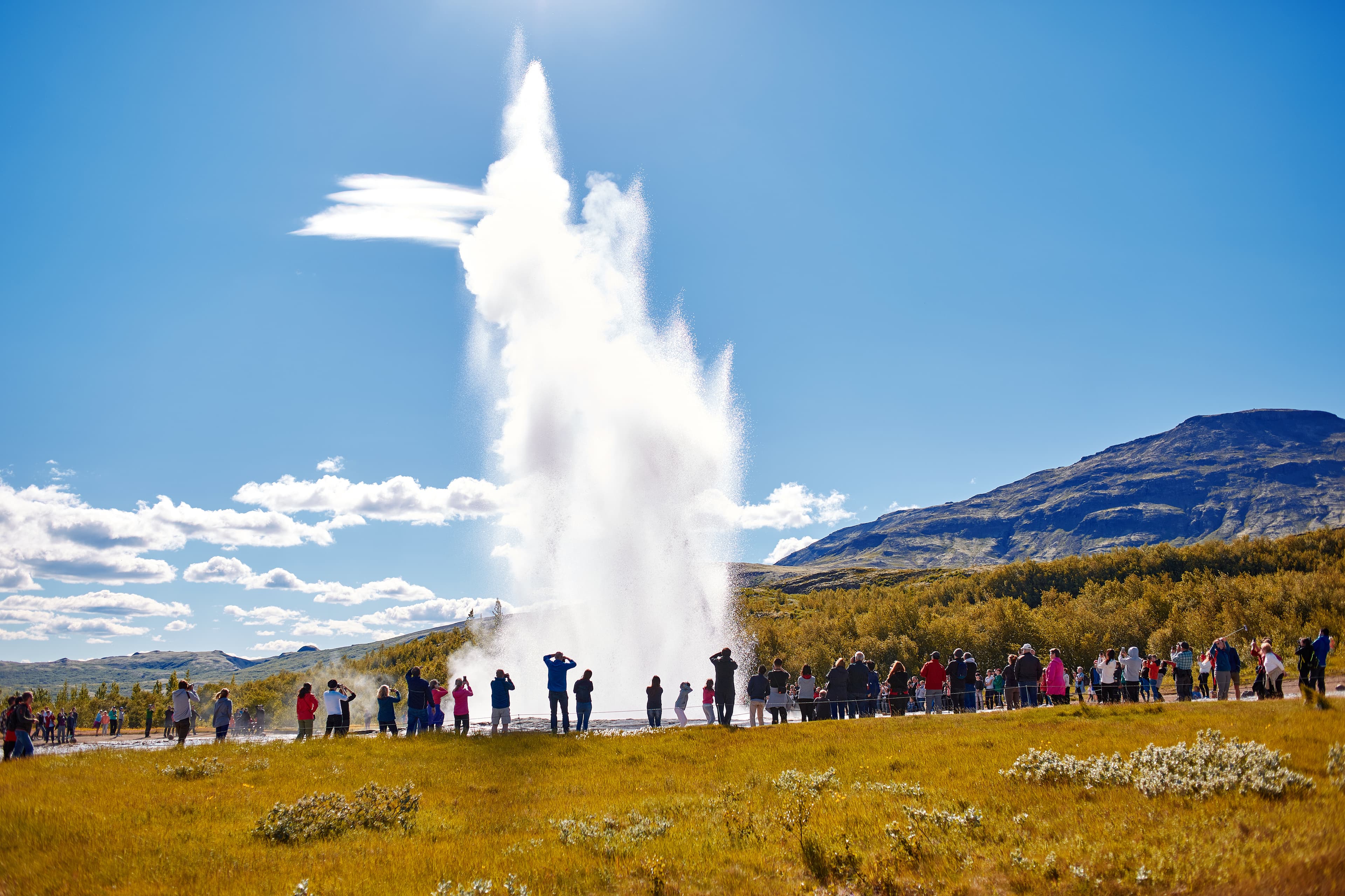 Summer in Iceland. Eruption of Strokkur Geyser in Iceland. Magnificent geyser Strokkur. Fountain Geyser throws azure water every few minutes Eruption of Strokkur Geyser in Iceland
