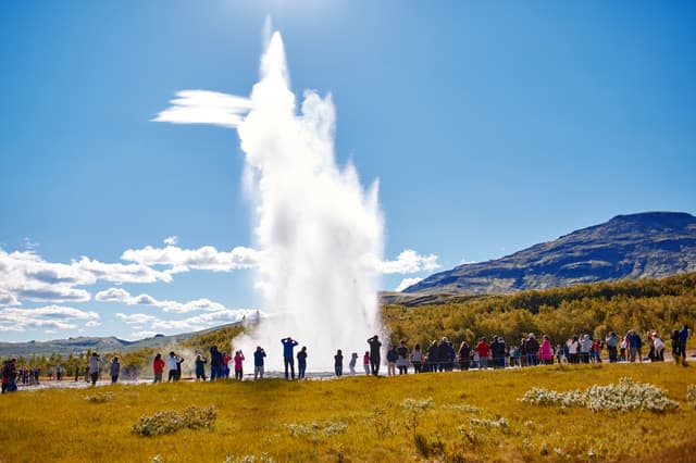 Summer in Iceland. Eruption of Strokkur Geyser in Iceland. Magnificent geyser Strokkur. Fountain Geyser throws azure water every few minutes Eruption of Strokkur Geyser in Iceland