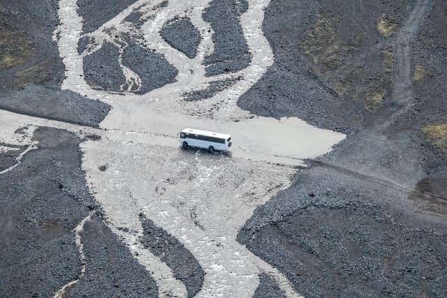Difficult cossing of glacial rivers near Thorsmork valley in the Highlands of Iceland at southern end of the famous Laugavegur hiking trail. Difficult cossing of glacial rivers near Thorsmork valley in the Highlands of Iceland at southern end of the famous Laugavegur hiking trail.