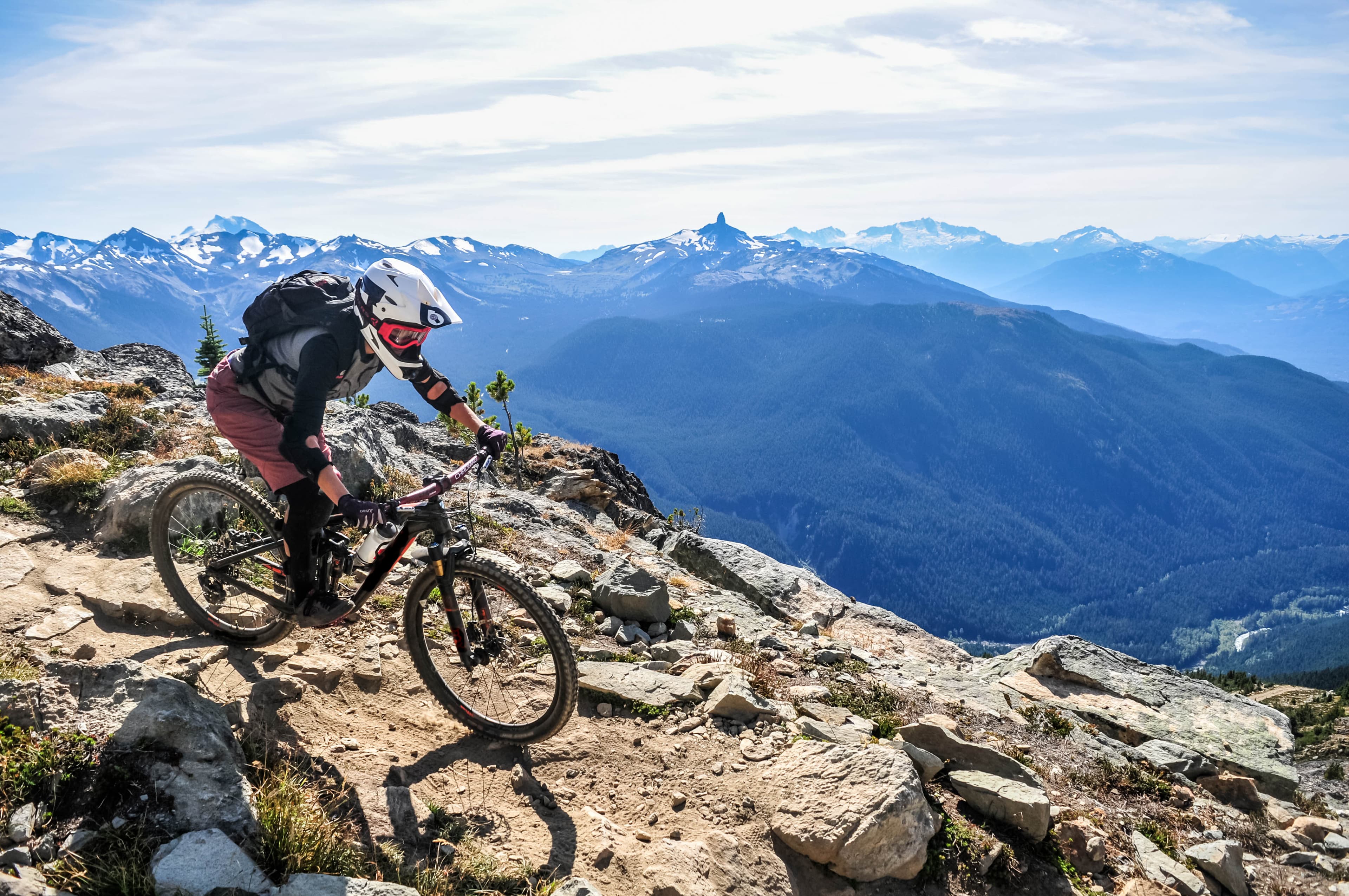 Man biking down the mountains in Whistler