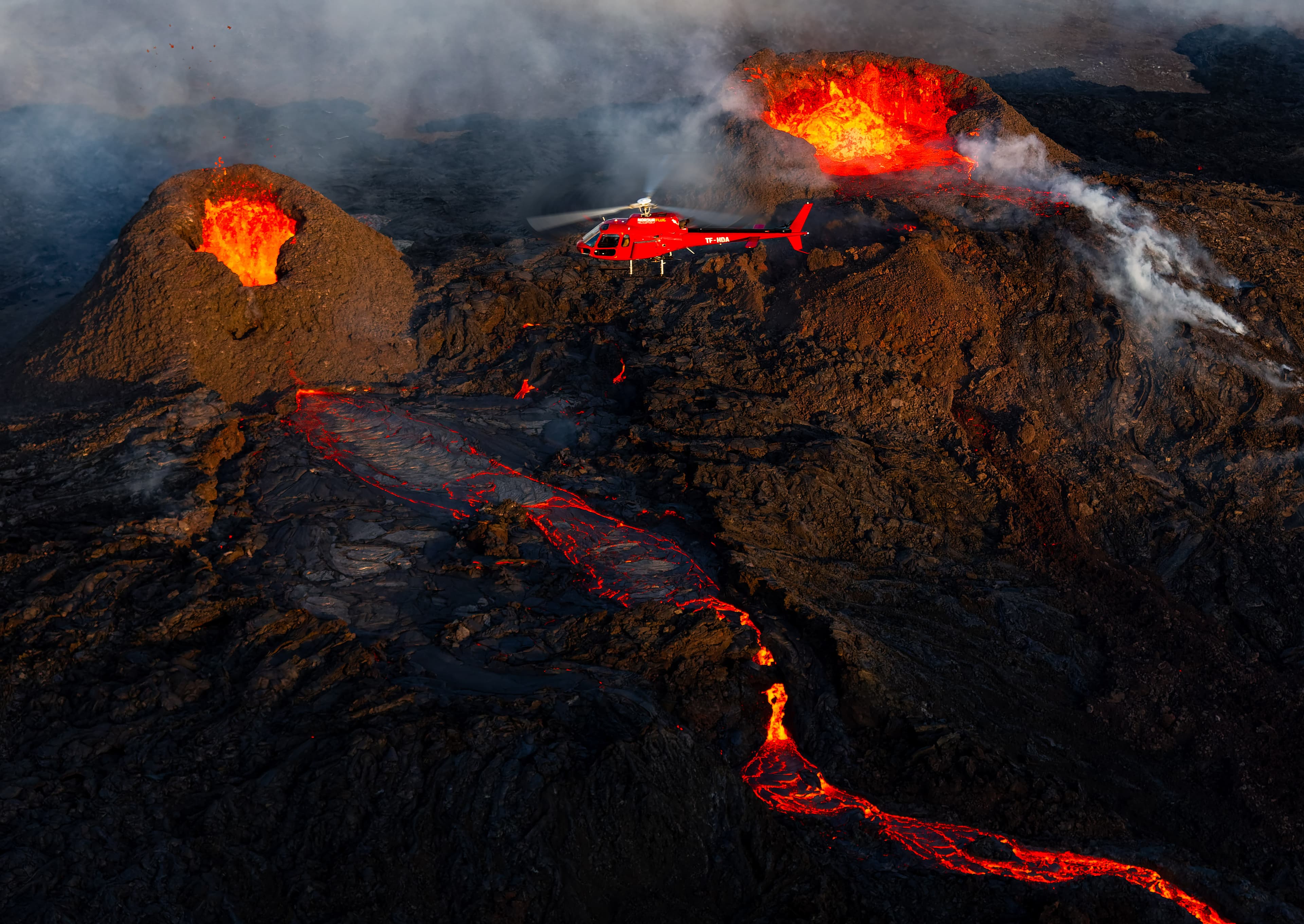 Eruption, Craters, Lava in Geldingadalur, Reykjanes Helicopter-flying-above-Volcano-eruption