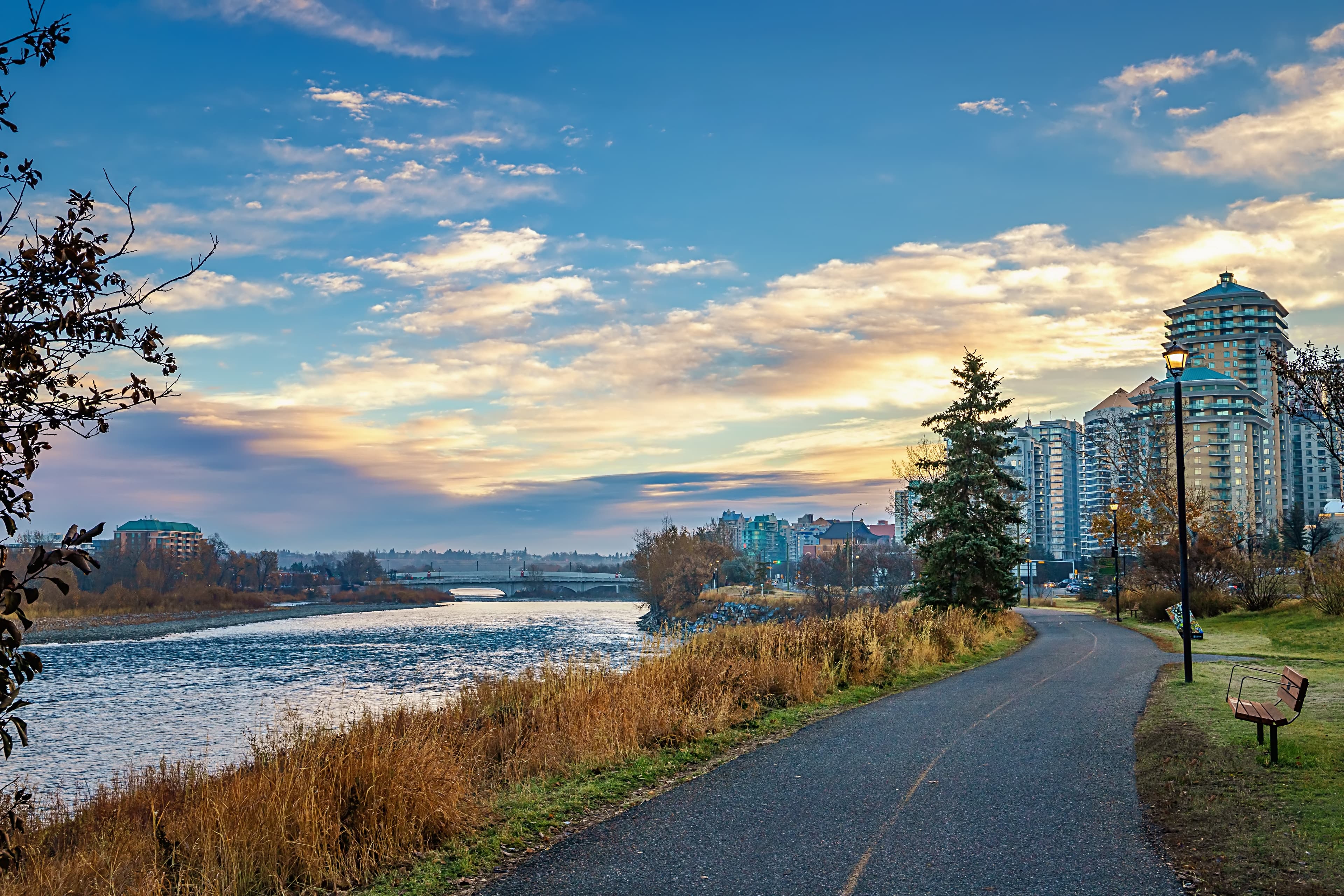 Scenic Sunrise Park Pathway By The Bow River