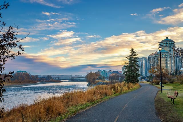 Scenic Sunrise Park Pathway By The Bow River