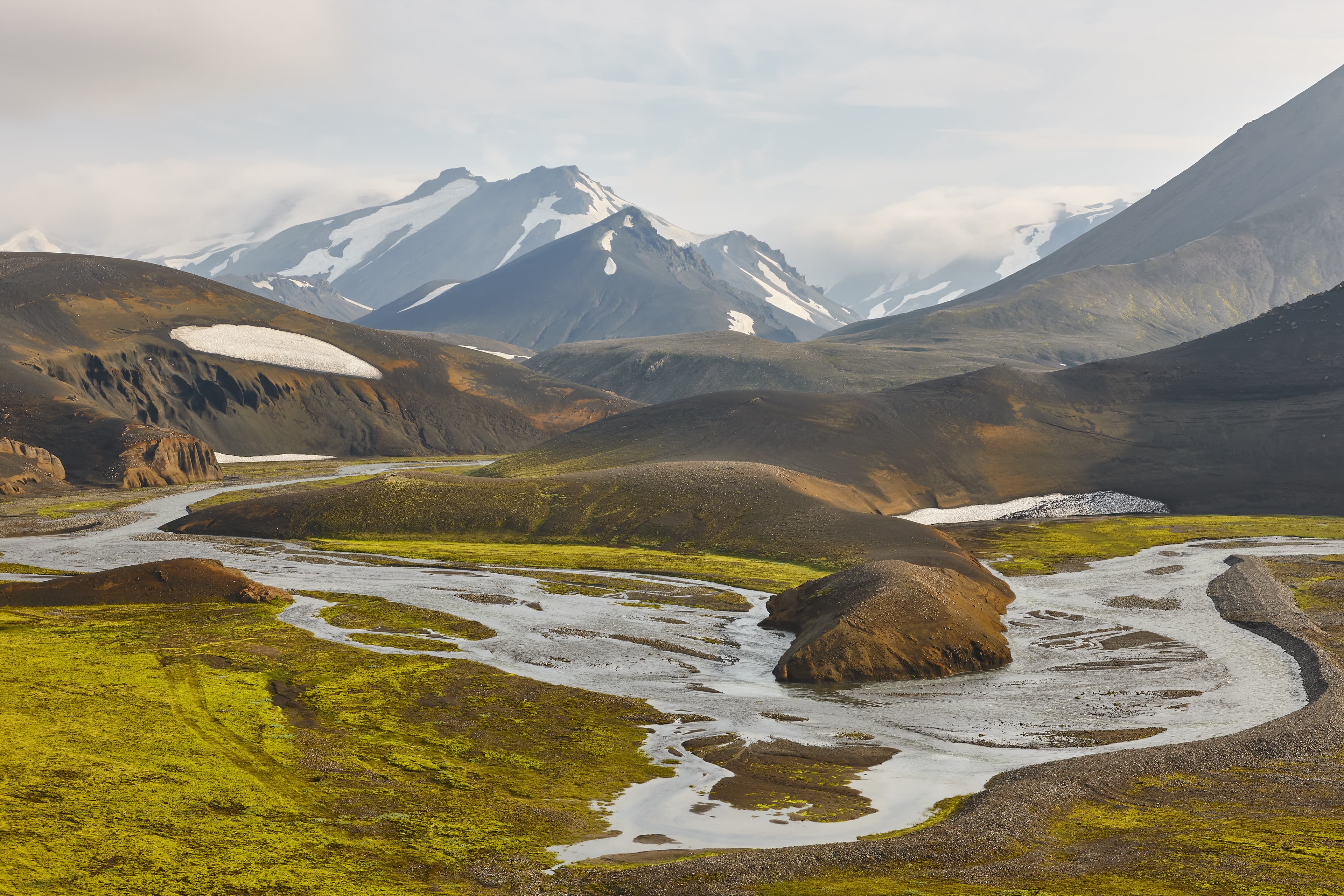 Porsmork valley and river with snowy volcanic mountains landscape. Iceland Porsmork valley and river with snowy volcanic landscape. Iceland